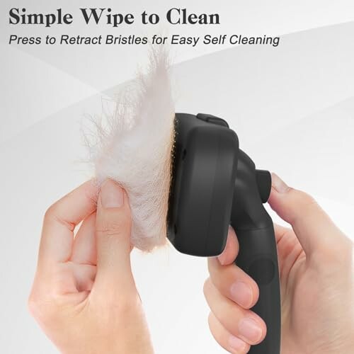 Hand holding a pet grooming brush with self-cleaning feature.
